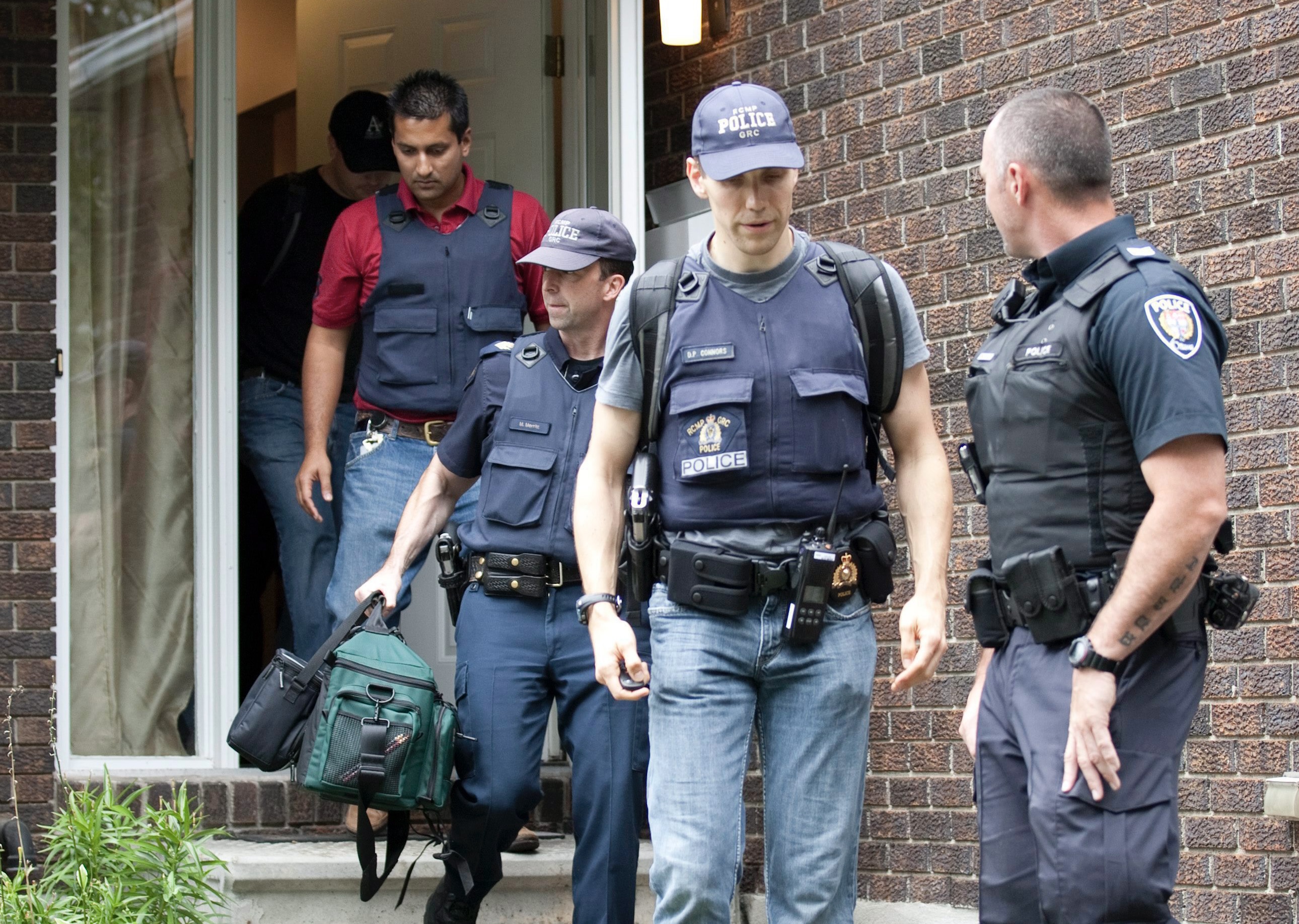 Police search Ottawa house following arrest of Hiva Alizadeh, August 25, 2010. THE CANADIAN PRESS/Adrian Wyld