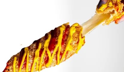 A traditional corndog, rolled in Panko crumbs and topped with Japanese mayo and teriyaki sauce.