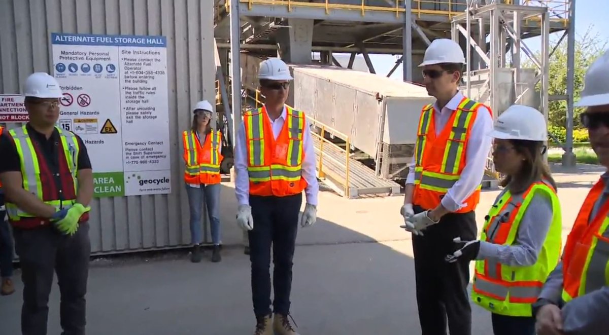 B.C. Premier David Eby tours the Lafarge Canada facility in Richmond, B.C. on Monday, May 15, 2023. 
