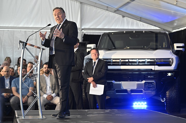 Quebec Premier Francois Legault speaks to guests as his government and the federal government announce major investments in EV car battery making components, Monday, May 29, 2023  in Becancour, Que.