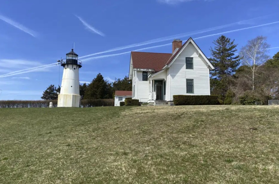 Warwick Neck Light, that dates to 1827 and was a onetime important navigation tool for mariners making their way to Providence, R.I., stands near Narragansett Bay, April 12, 2023, in Warwick, R.I.