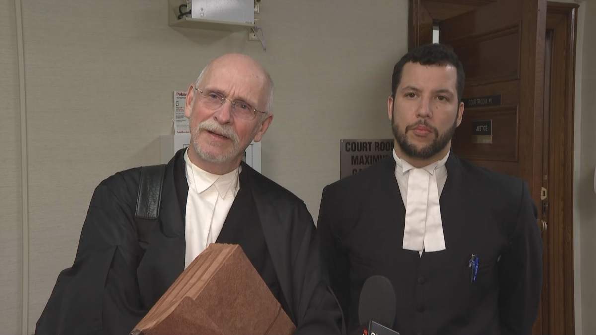 Defence lawyers Malcolm Jeffcock and Alexander MacKillop are pictured shortly after Prosper’s sentencing.