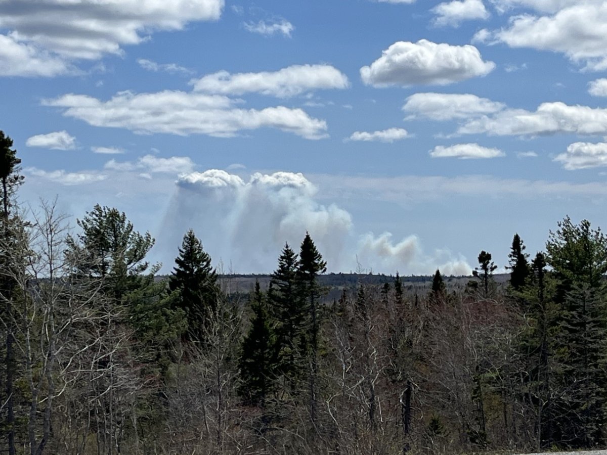 Clouds of smoke from an ongoing forest fire in Little Harbour, Shelburne County appear in the distance. Photo courtesy of Jason Dain.
