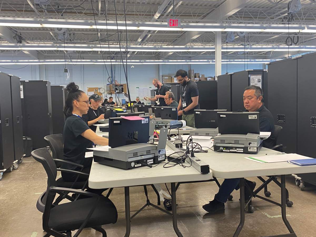 Toronto Elections workers prepare equipment ahead of the city's biggest byelection ever. 