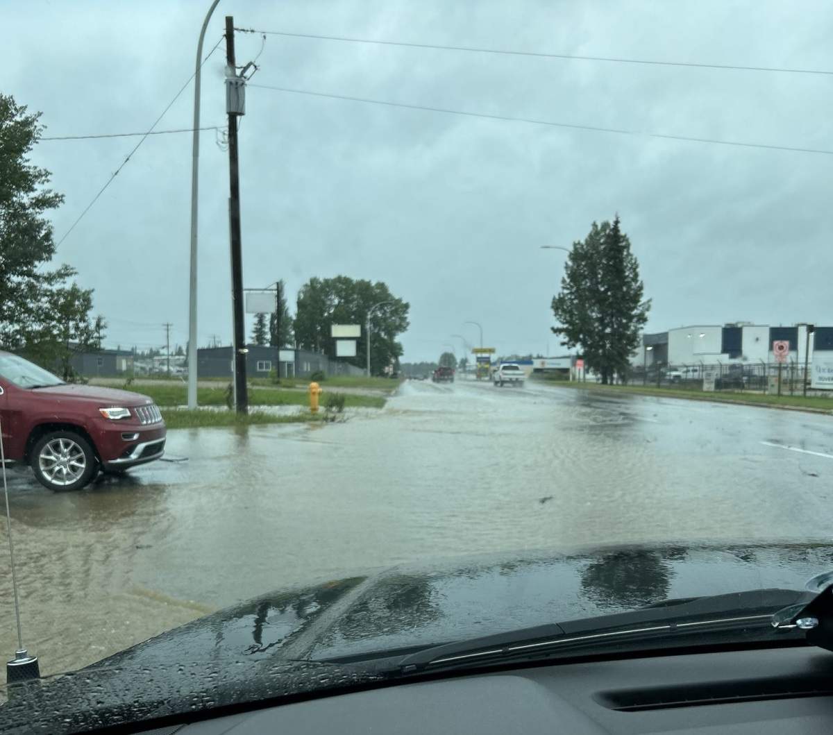 Flooding in Edson, Alta., at 2 Avenue and 48 Street on June 19, 2023.
