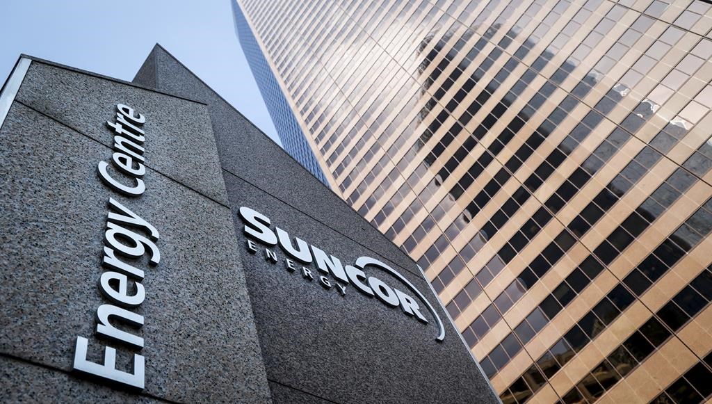 Experts say the 1,500 job losses at Suncor Energy Inc. that were made public Thursday are an example of the type of "collateral damage" that can occur when an activist investor comes calling. The Suncor Energy Centre picture in downtown Calgary, Alta., Friday, Sept. 16, 2022.