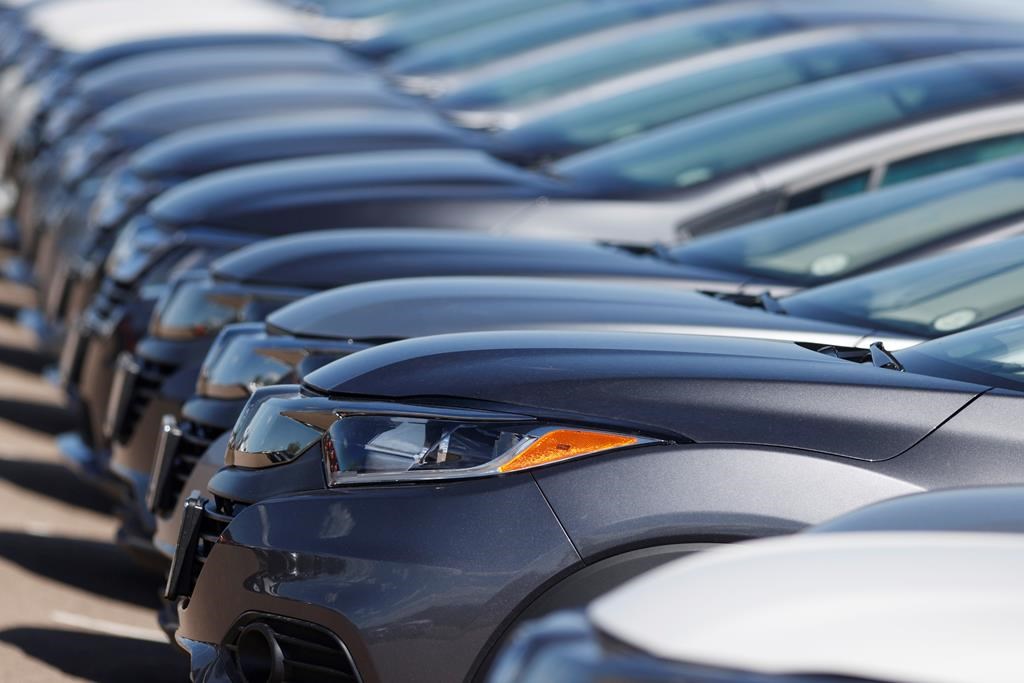 A long row of unsold cars at a dealership in Highlands Ranch, Colo., on June 7, 2020. 