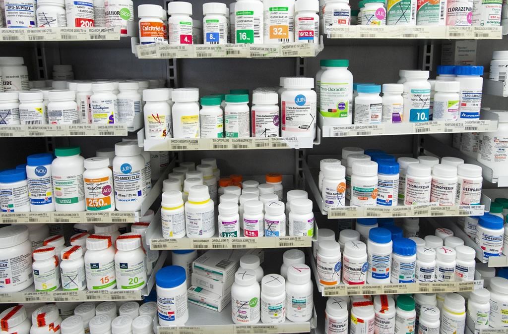 Prescription drugs are seen on shelves at a pharmacy in Montreal, Thursday, March 11, 2021.