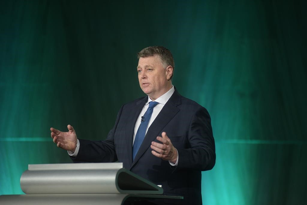 Dennis King gestures as he answers a question during an election leaders debate in Charlottetown, March 27, 2023. King says he wouldn’t want his own children attending the University of Prince Edward Island, following a damning independent review of the school. THE CANADIAN PRESS/Brian McInnis.