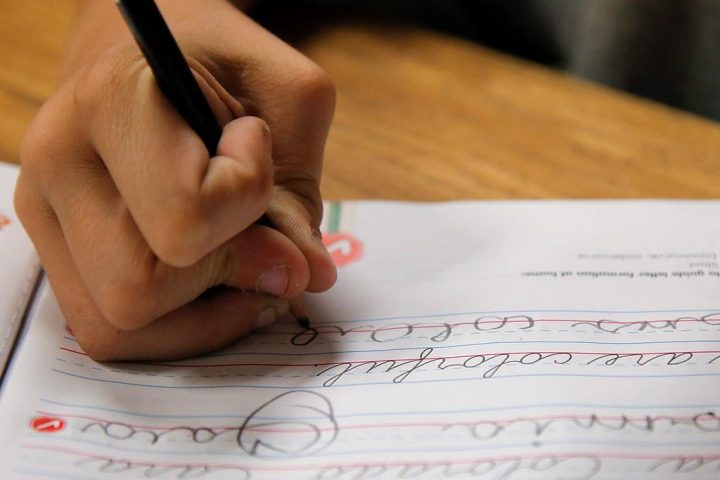 A student practices writing in cursive at St. Mark’s Lutheran School in Hacienda Heights, Calif., Thursday, Oct. 18, 2012. Cursive is making a comeback. Relegated in 2006 to an optional piece of learning in Ontario elementary schools, it is set to return as a mandatory part of the curriculum starting in September. 