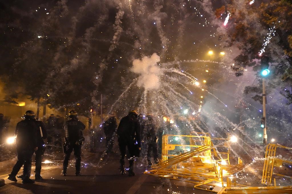 Police forces clash with youths in Nanterre, outside Paris, Thursday, June 29, 2023.