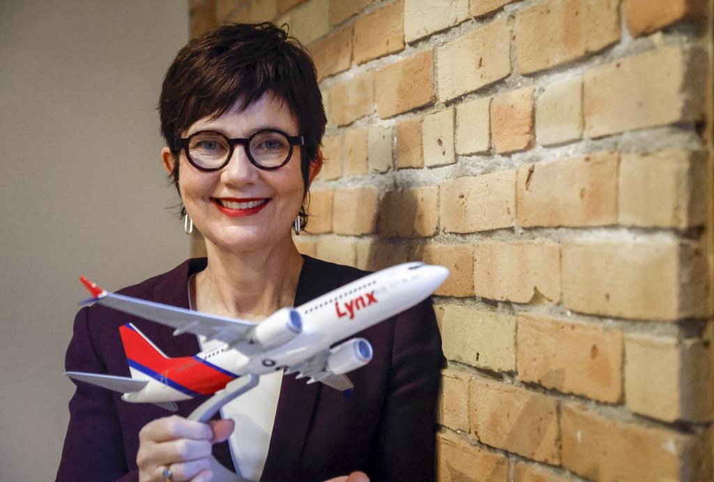 Lynx Air CEO Merren McArthur, one of the first women to head a national commercial airline in Canada, poses for a portrait in Calgary, Alta., Friday, Jan. 28, 2022. The airline announced McArthur is stepping down in September 2023. THE CANADIAN PRESS/Jeff McIntosh.