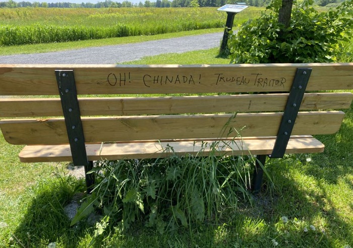 Police say they are looking for a man who has defaced benches at Lemoine Point with vandalism pointed at Prime Minister Justin Trudeau.