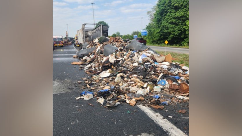Ontario Provincial Police say a tractor trailer engulfed by flames was the cause of early traffic tie ups on Highway 403 June 2, 2023.