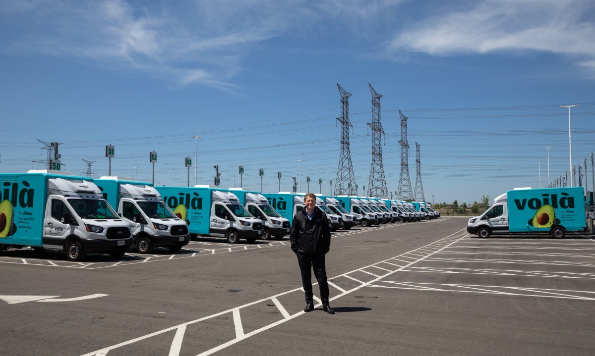 Empire CEO Michael Medline in front of the fleet of new Voila grocery delivery trucks at their new Vaughan distribution centre. Empire Company's new 250,000-square-foot distribution centre will sort and distribute groceries to the GTA for their new online grocer service Voila. Empire owns the Sobeys grocery chain. June 15, 2020