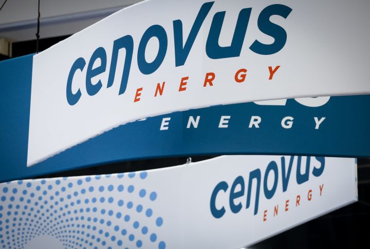 Cenovus Energy logos are on display at the Global Energy Show in Calgary, Alta., Tuesday, June 7, 2022. The Calgary-based oil company says its refinery throughput for the third quarter of 2022 and the first quarter of 2023 will be weaker than expected.