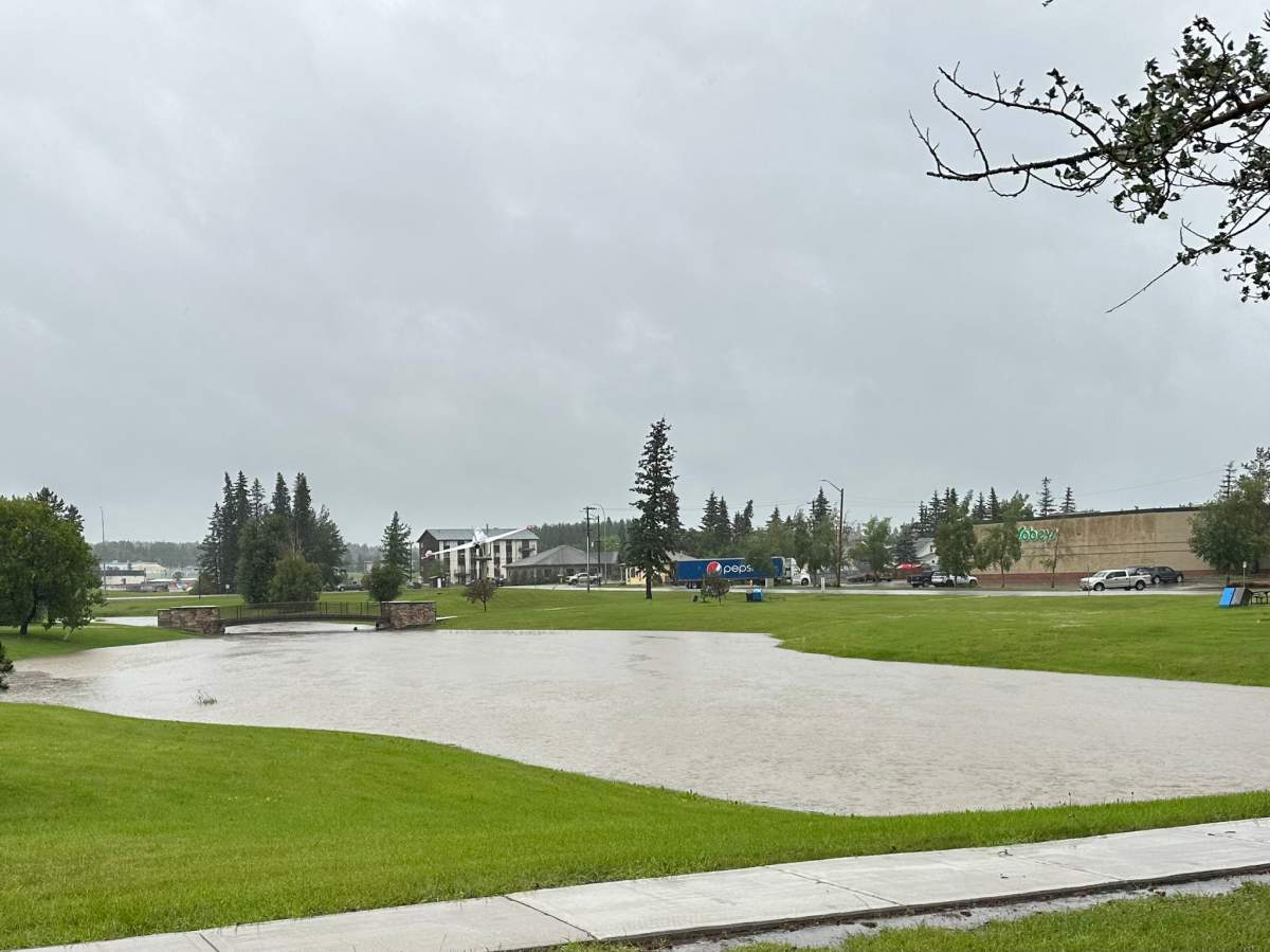 Heavy rainfall caused Bench Creek through Centennial Park to flood and become a lake as the town of Edson dealt with flooding on Monday, June 19, 2023.
