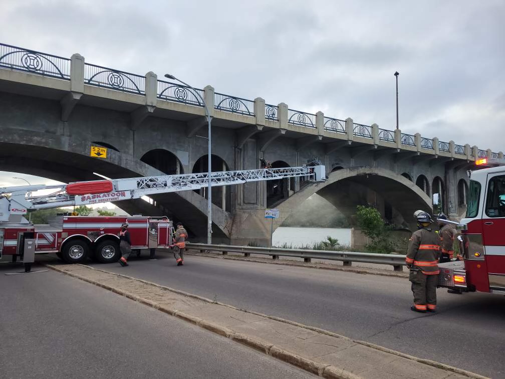 Fire crews are battling a blaze under University Bridge.