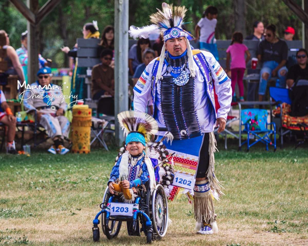 Young dancer with limited mobility moves crowd at Kahkewistahaw powwow - image