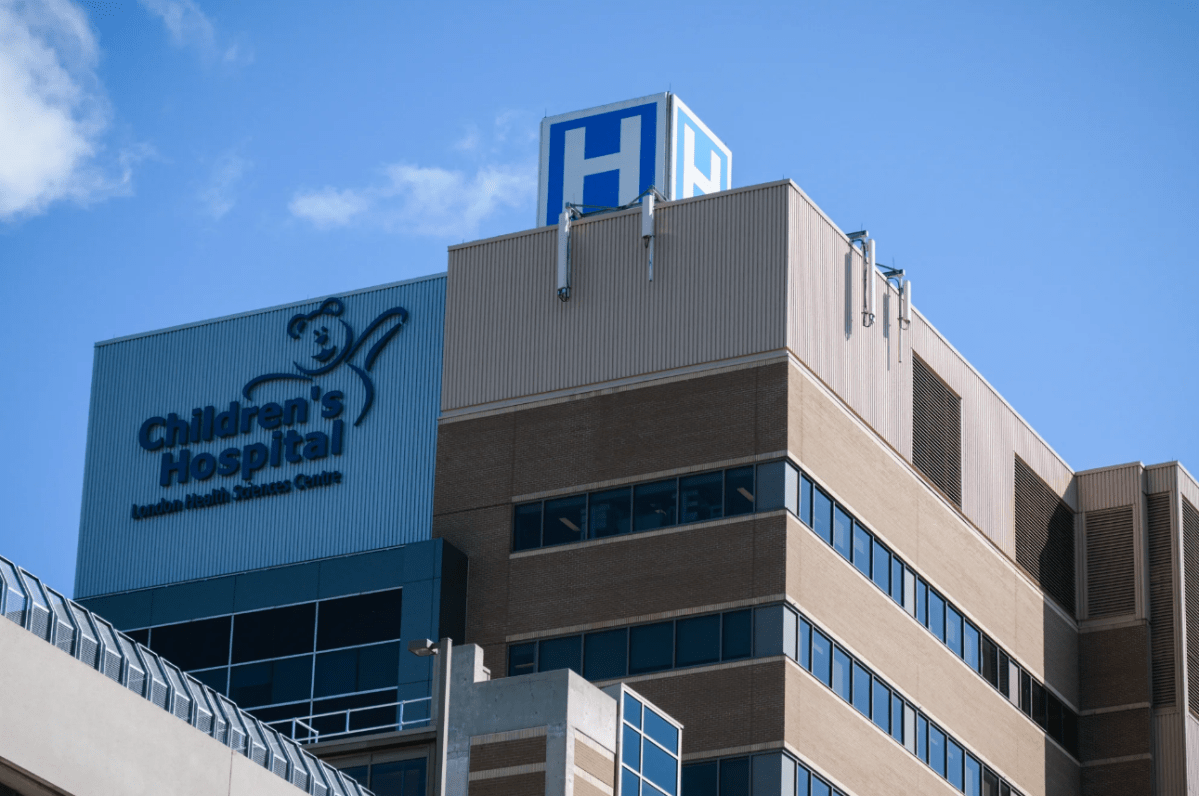 The facade of the Children's Hospital at LHSC on a sunny day.