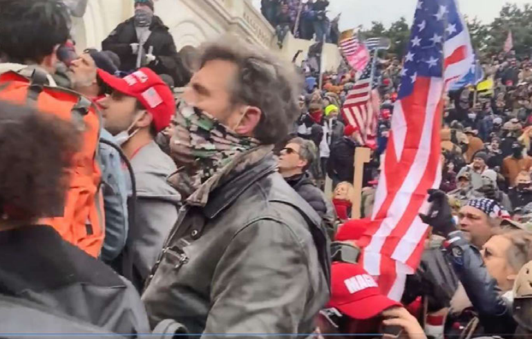 Jay Johnston wearing a bandana mask at the U.S. Capitol riot on Jan. 6.