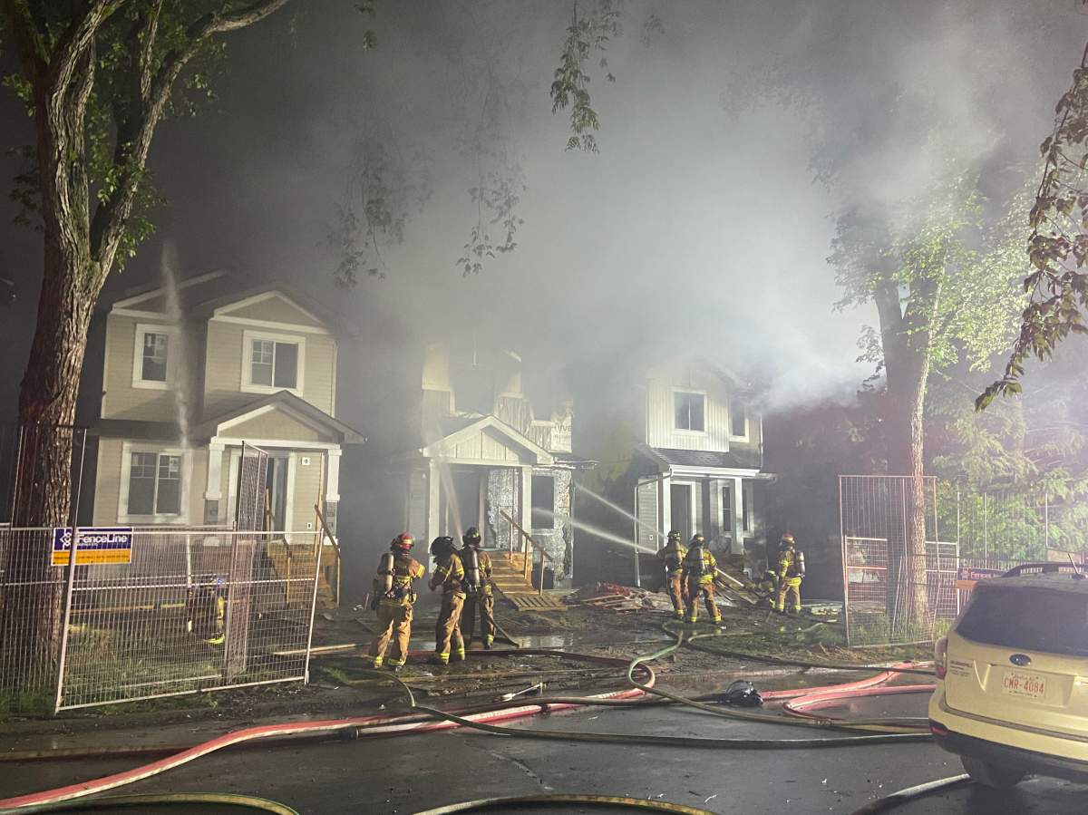 An image of the damage of three nearly constructed homes after a fire in East Edmonton early Wednesday June 14. 2023.