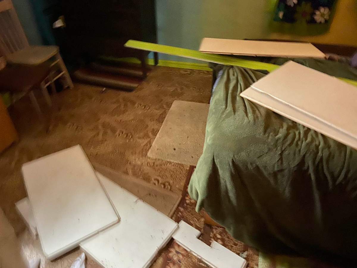 A storm caused ceiling tiles to collapse at this cabin in Ma-Me-O Beach on Pigeon Lake in central Alberta on Wednesday, June 14, 2023.