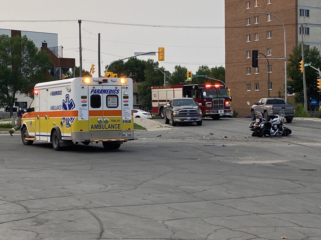 Emergency crews were on scene Wednesday morning after a crash between a car and a motorcycle on Talbot Avenue.