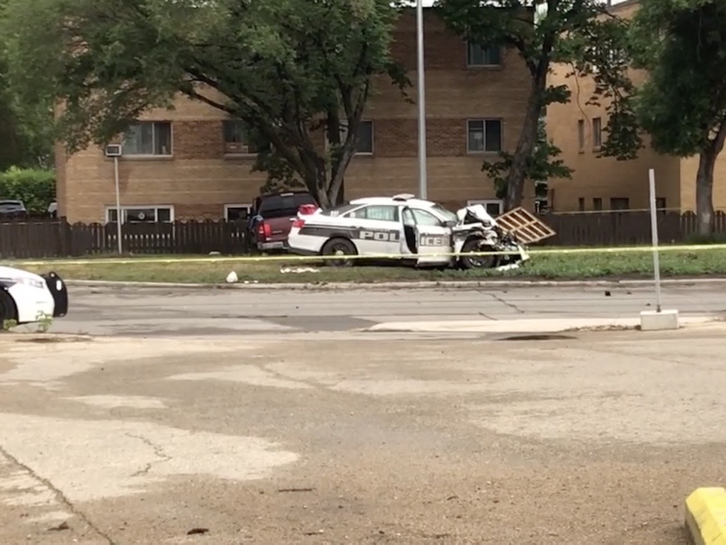 Crash between cop car, pickup closes Main Street Wednesday morning