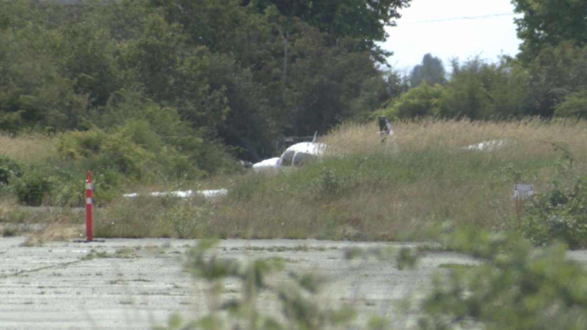 An airplane is seen off the runway at Boundary Bay Airport in Metro Vancouver after an accident on Thurs. June 29, 2023. The federal Transportation Safety Board has been called in to investigate.