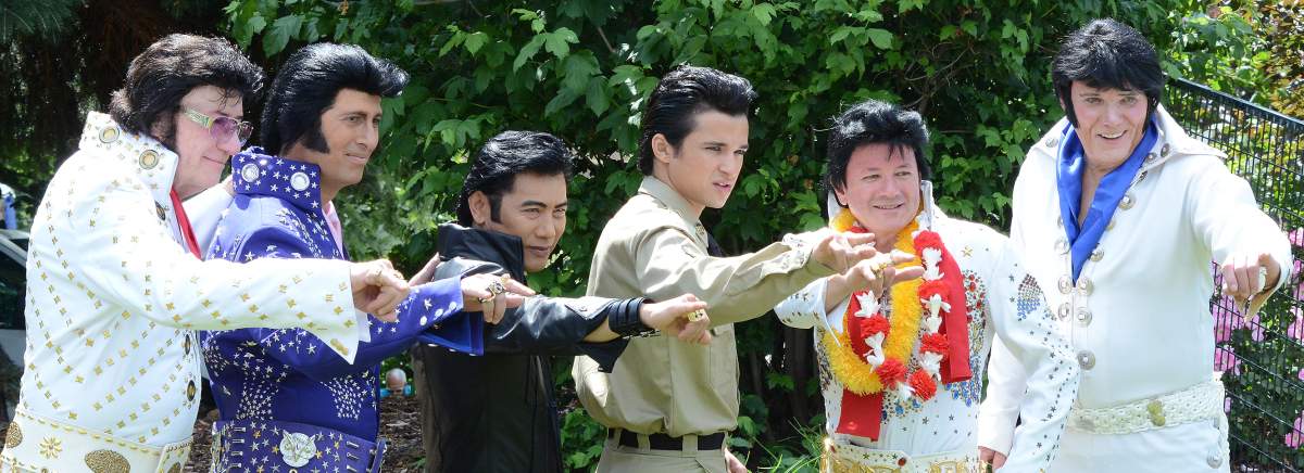 Elvis tribute artists line up for a photo at the Penticton Pacific Northwest Elvis Festival.