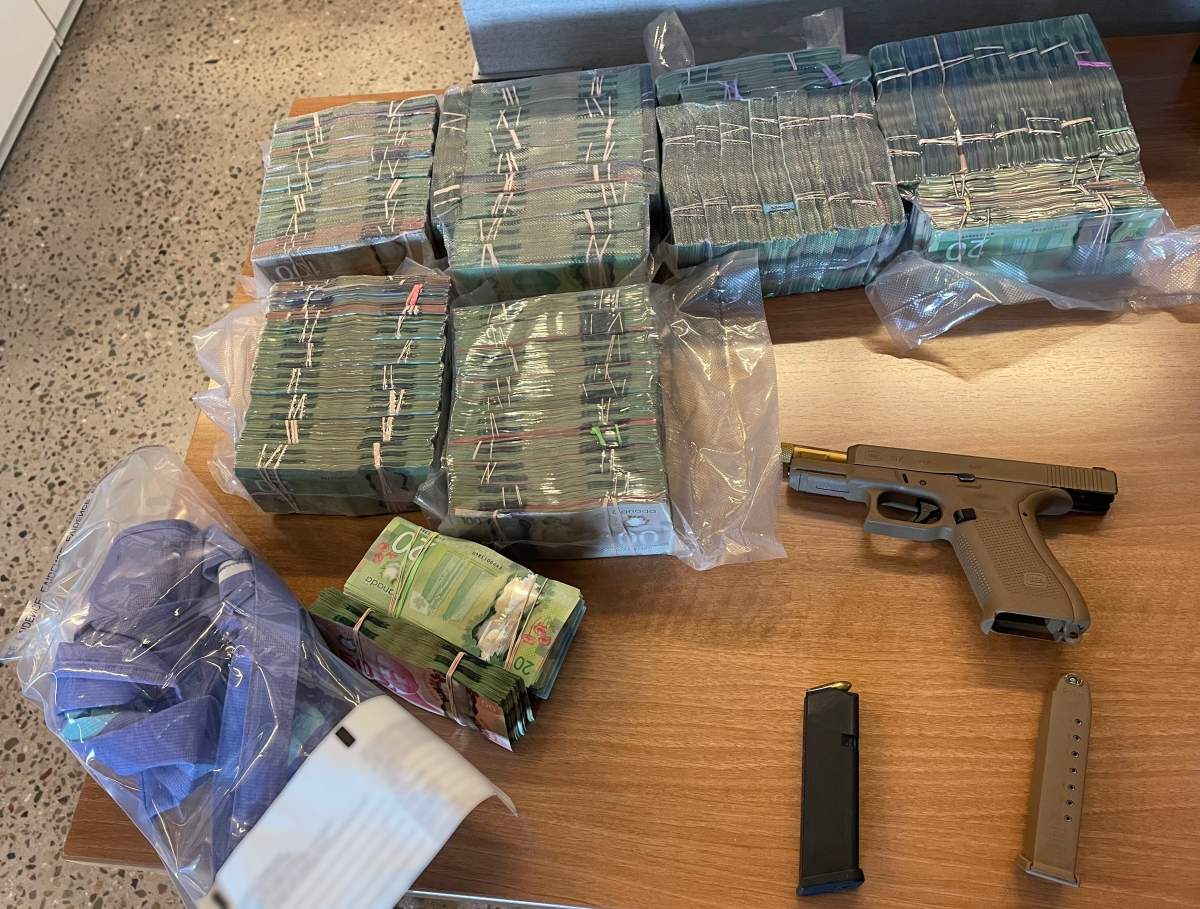 A firearm and cash seized by Saskatchewan RCMP in the Maidstone area.