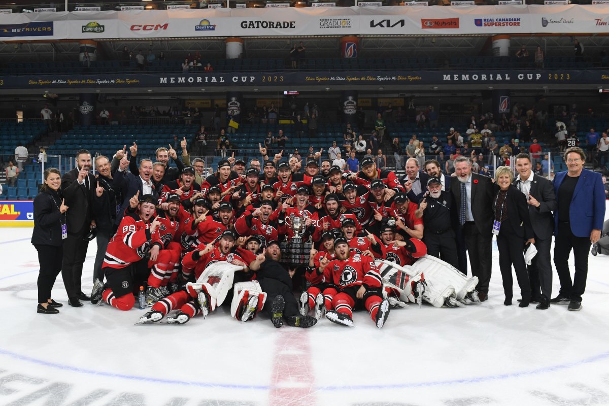 The Quebec Remparts gather for a team photo after winning the 2023 Memorial Cup in Kamloops, B.C., on Sunday, June 4, 2023. Quebec blanked the Seattle Thunderbirds 5-0 in the championship game.