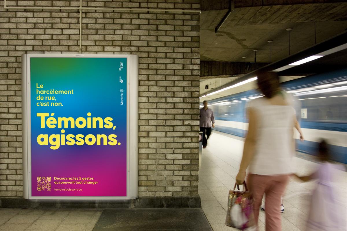 A sign hangs in the metro as part of a new campaign against harassment in Montreal.
