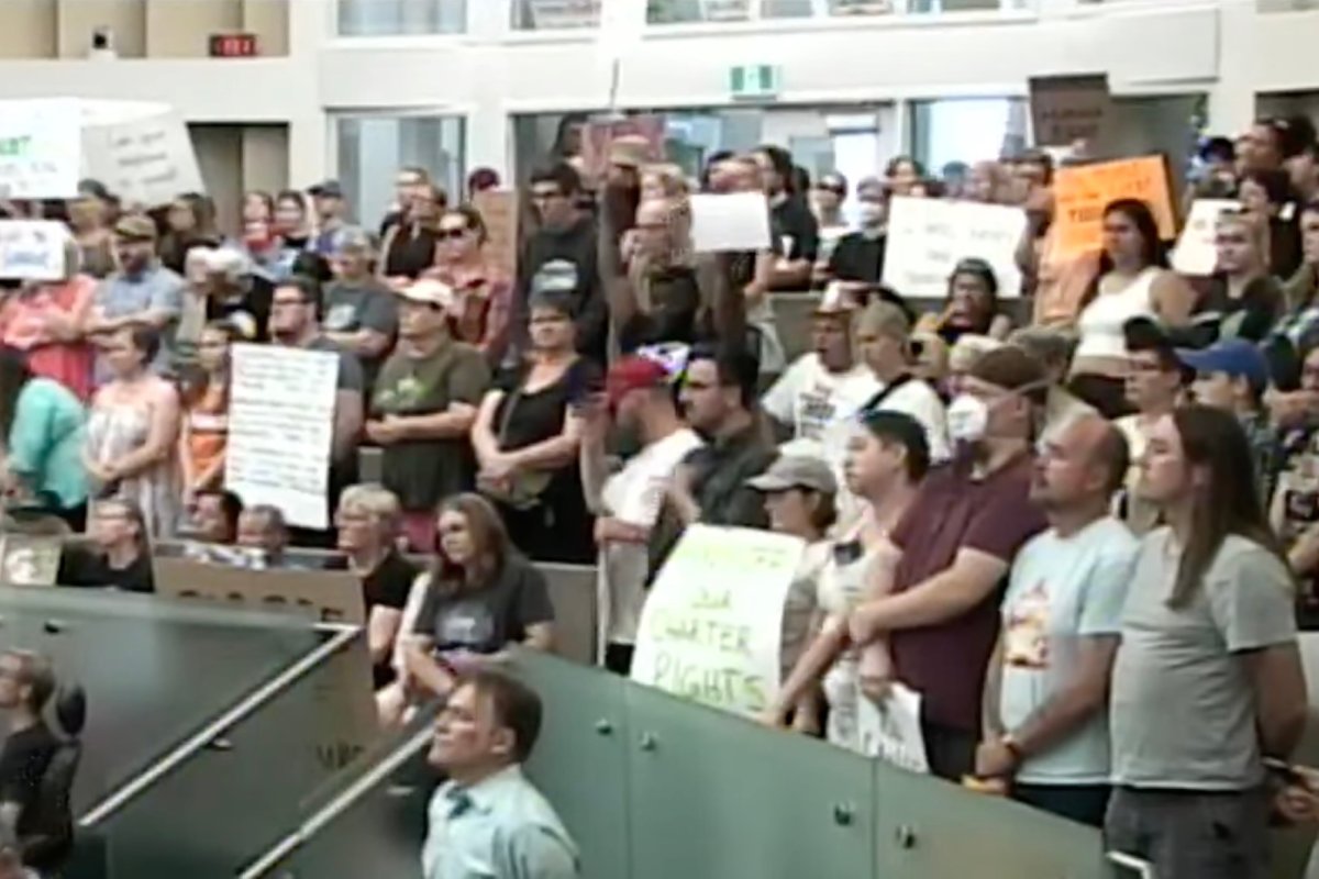 Wednesday night’s meeting saw a packed council chamber of residents holding signs protesting the bylaw’s changes in Barrie Ontario. 