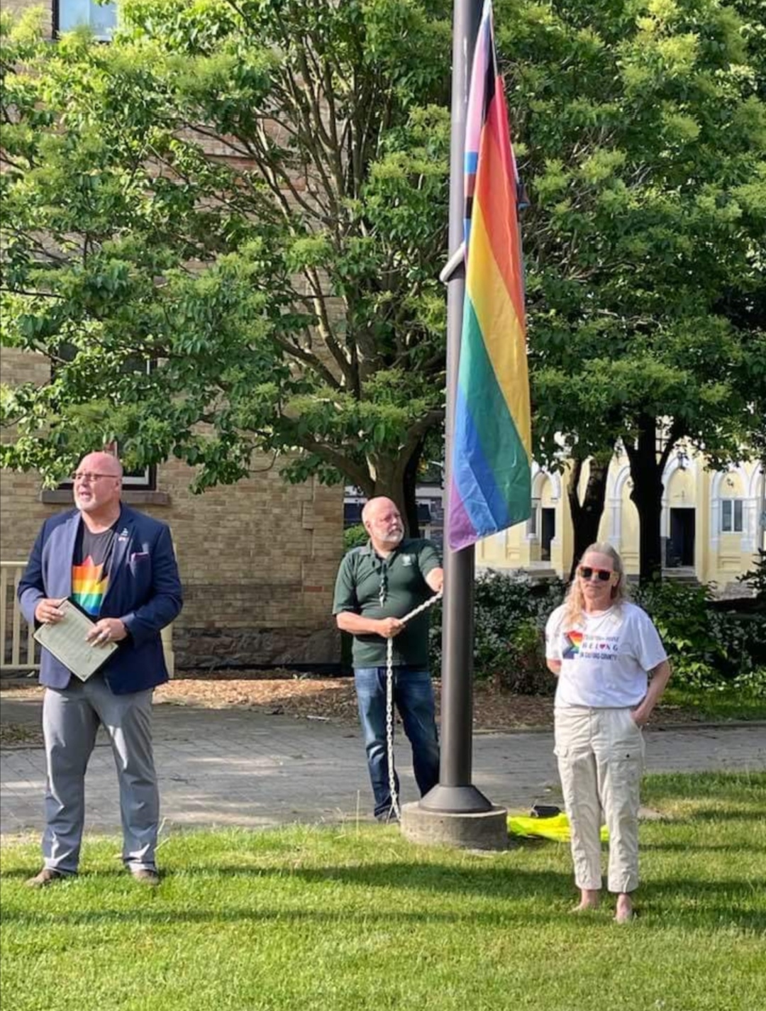 Woodstock Mayor Jerry Acchione, left, and Oxford County Pride Committee president Tami Murray at the progress Pride flag raising ceremony on June 1, 2023.