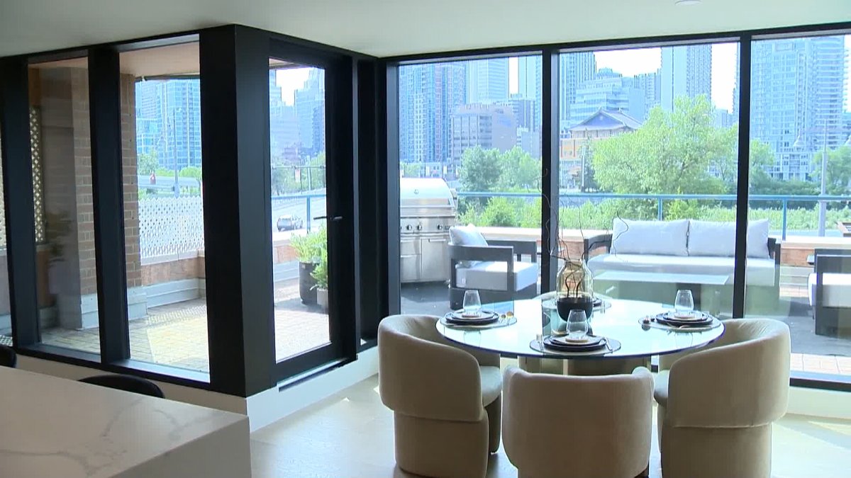 The view out at Calgary's downtown and Bow River from within a show suite on the site of the planned Kenten building.