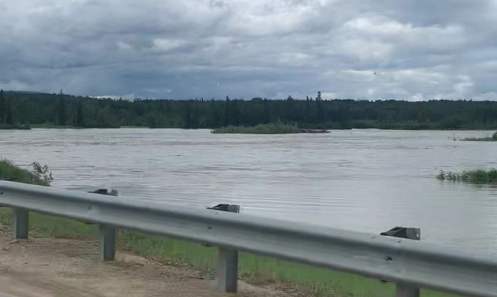 Floodwaters are seen in Whitecourt, Alta., on June 20, 2023.