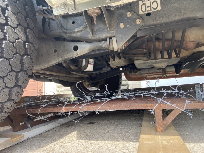 John Kloosterman wrapped barbed wire around a metal pallet to deter thieves from stealing his catalytic converter.