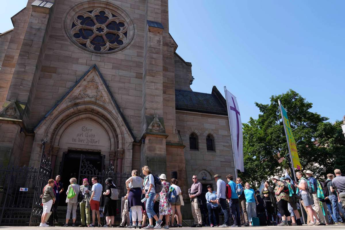 Hundreds line up for church in Germany