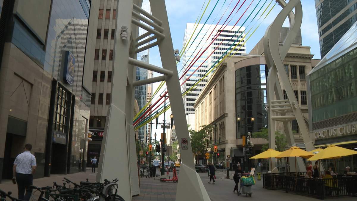 The Novus Textura art installation on Stephen Avenue wraps itself through the branches of the Galleria Trees.
