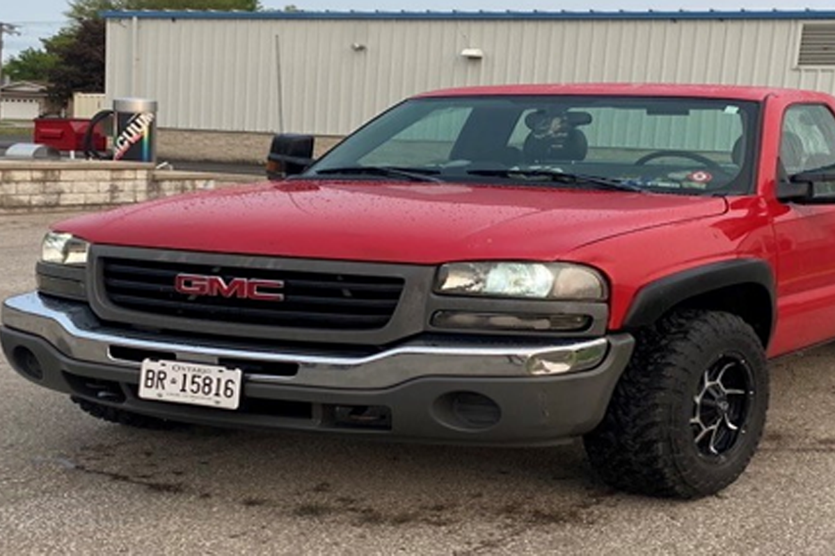 A red GMC Sierra was stolen just south of Exeter on Tuesday.