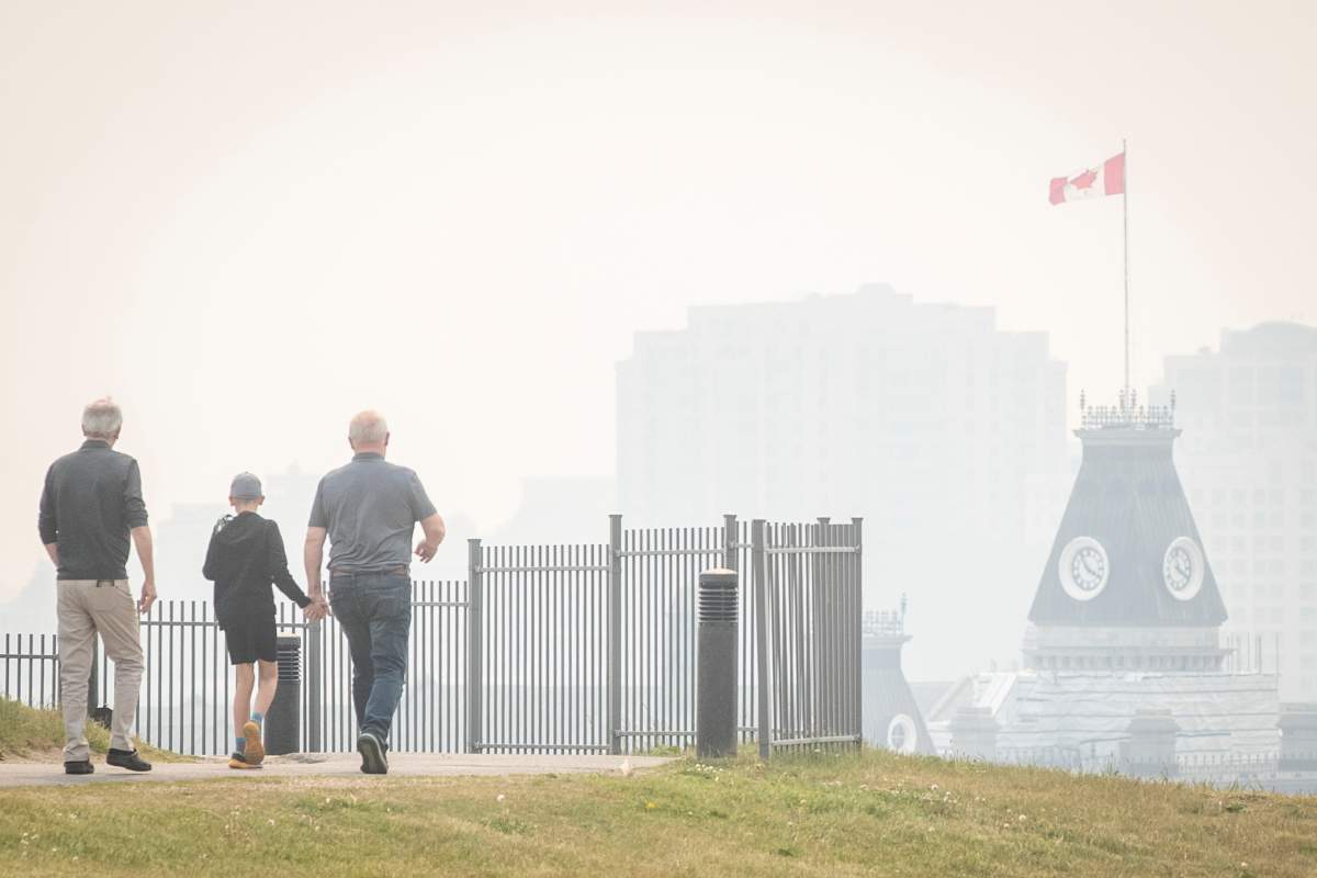 Smoke from wildfires burning across both Ontario and Quebec blanket the skyline in Kingston, Ont., on Tuesday. THE CANADIAN PRESS/Lars Hagberg