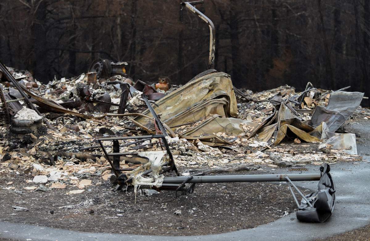 A basketball hoop lies in front of destroyed home on Carmel Crescent following last week’s wildfire in Hammonds Plains, N.S. Tuesday June 6, 2023.
