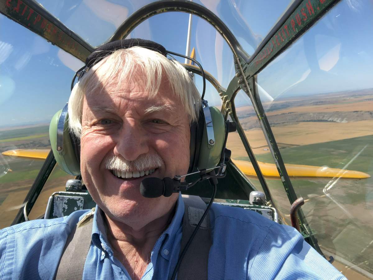 Kendall Gibson taking a selfie while flying in the Harvard Mk4.