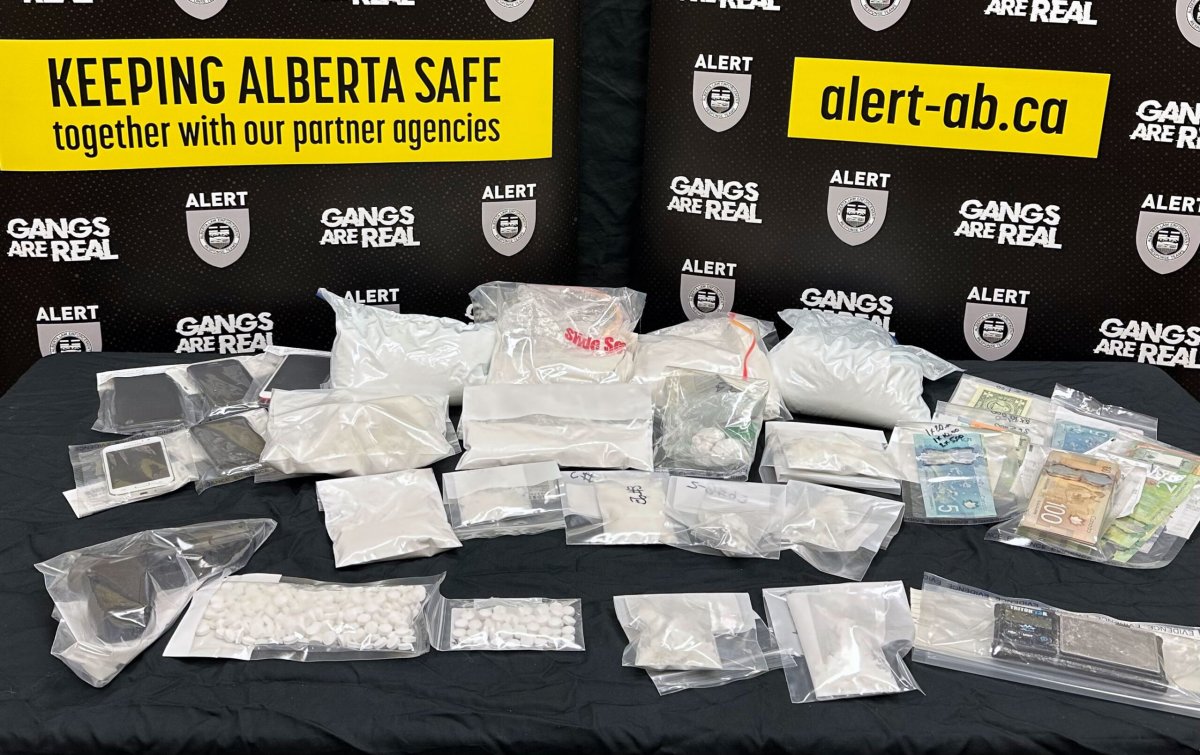 Police say officers seized around $150,000 in drugs and cash in Fort McMurray.