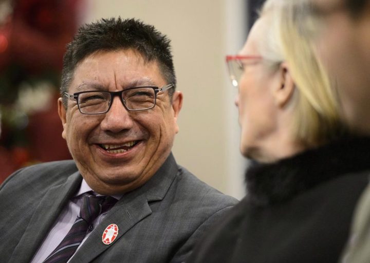 Grand Chief Alvin Fiddler, left, looks towards Carolyn Bennett, then minister of Crown-Indigenous relations, as they participate in a ceremony to highlight the signing of an education Agreement-in-Principle in Ottawa on Wednesday, Dec. 5, 2018. THE CANADIAN PRESS/Sean Kilpatrick.