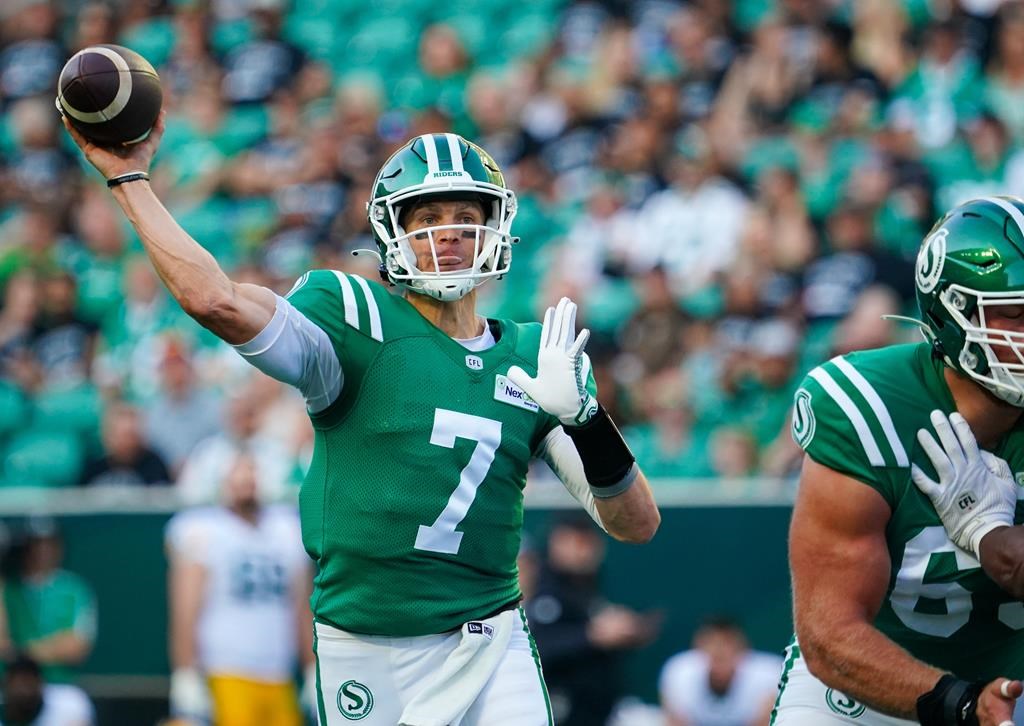 Saskatchewan Roughriders quarterback Trevor Harris (7) throws against the Edmonton Elks during the first half of CFL football action in Regina, on Thursday, July 6, 2023. Harris was named the top quarterback in the CFL's weekly honour roll Tuesday. THE CANADIAN PRESS/Heywood Yu.