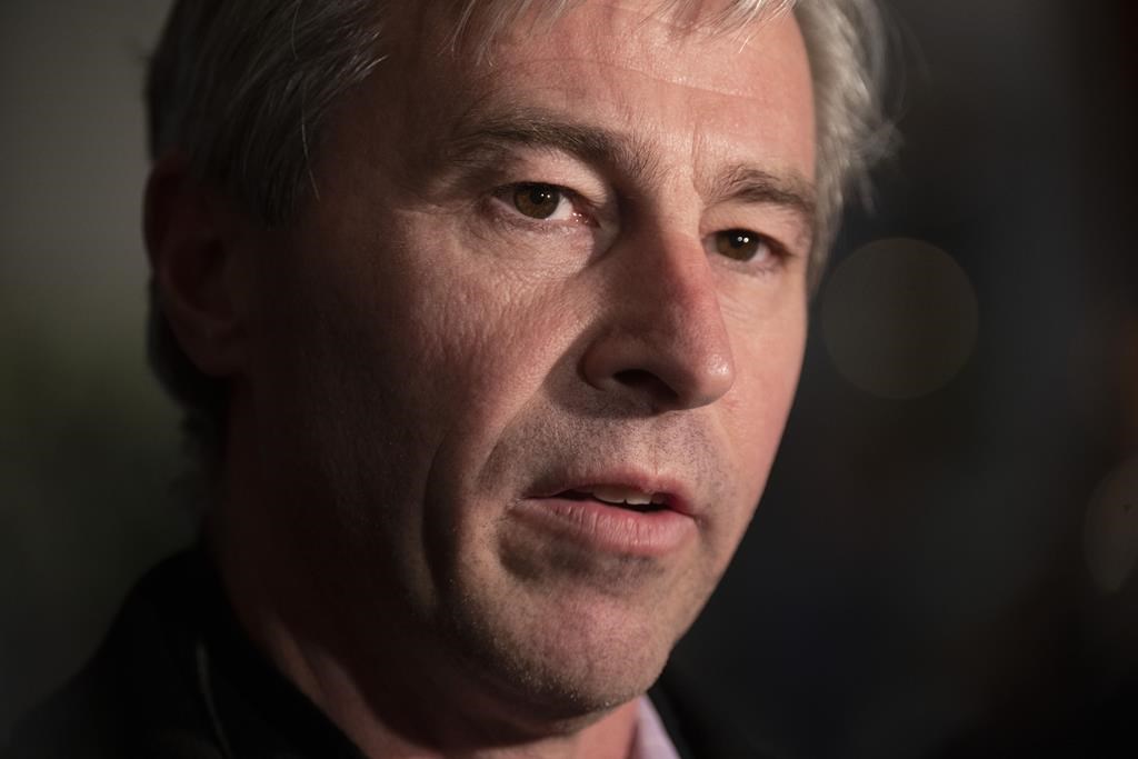 The Nova Scotia government is doubling down on its claim that it dismissed a judge leading a high-profile inquiry partly because the families involved had grown impatient with the process. Premier Tim Houston said his government had provided a number of extensions to provincial court Judge Warren Zimmer to allow him to finish his final report. Houston speaks with media, Monday, February 6, 2023 in Ottawa. THE CANADIAN PRESS/Adrian Wyld