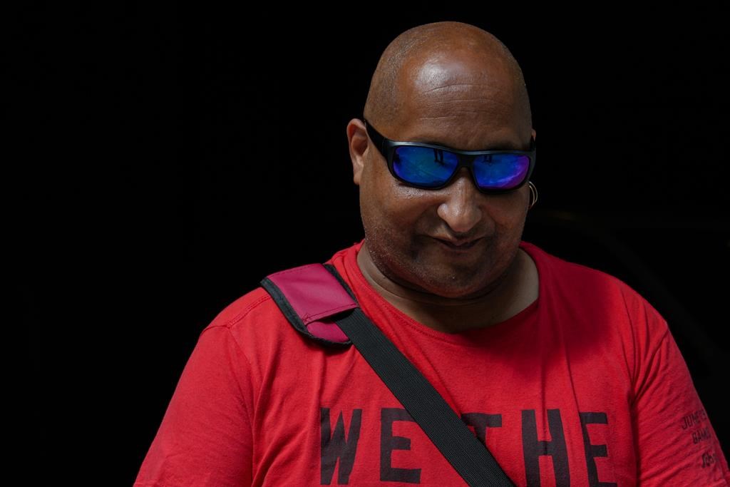 Michael Smith is photographed outside the Stratchona Hotel in Toronto on Wednesday July 11, 2023. Michael, along with other residents faces eviction from the hotel, which is being used to provide shelter to the unhoused, and THE CANADIAN PRESS/Chris Young